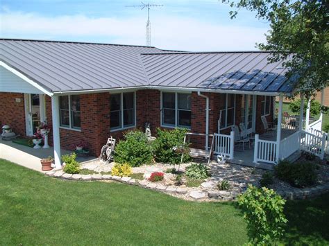 painted brick house with metal roof|metal roof on brick ranch.